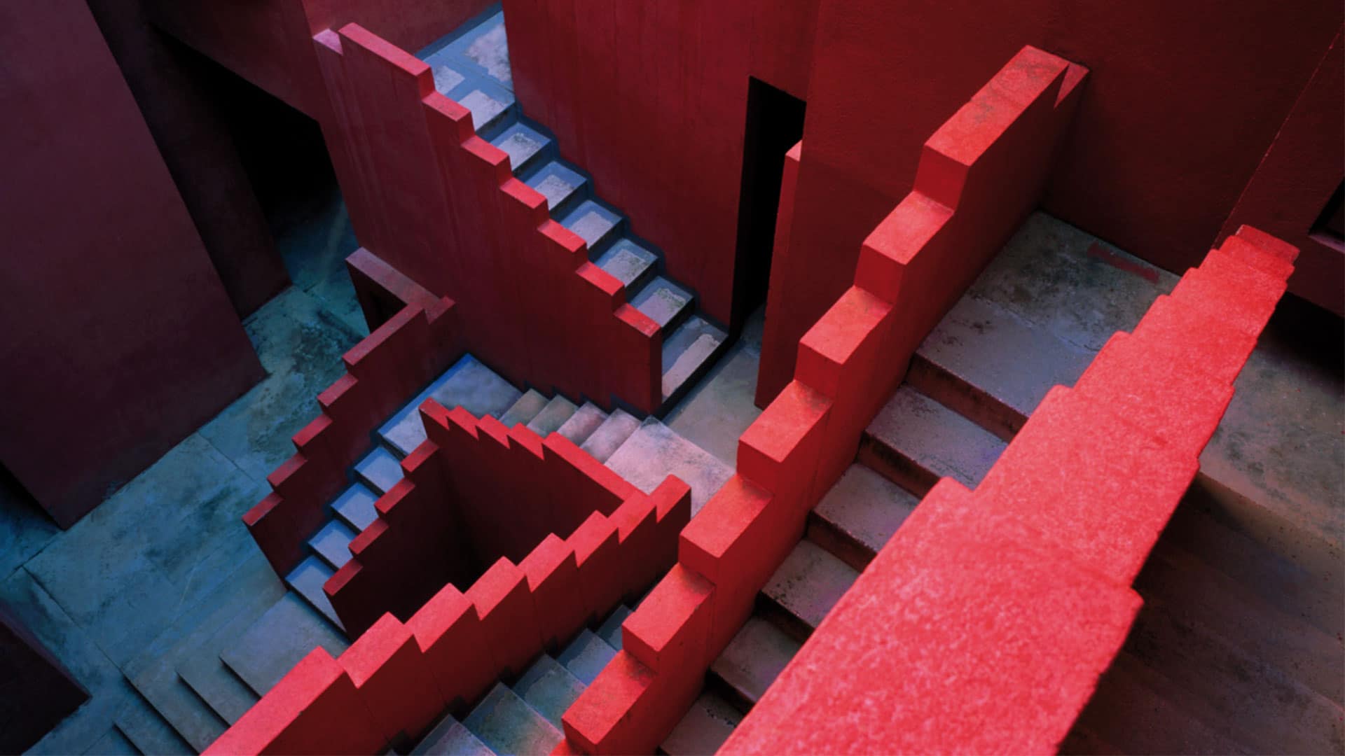 La Muralla Roja image of the red concrete stairs handrail.