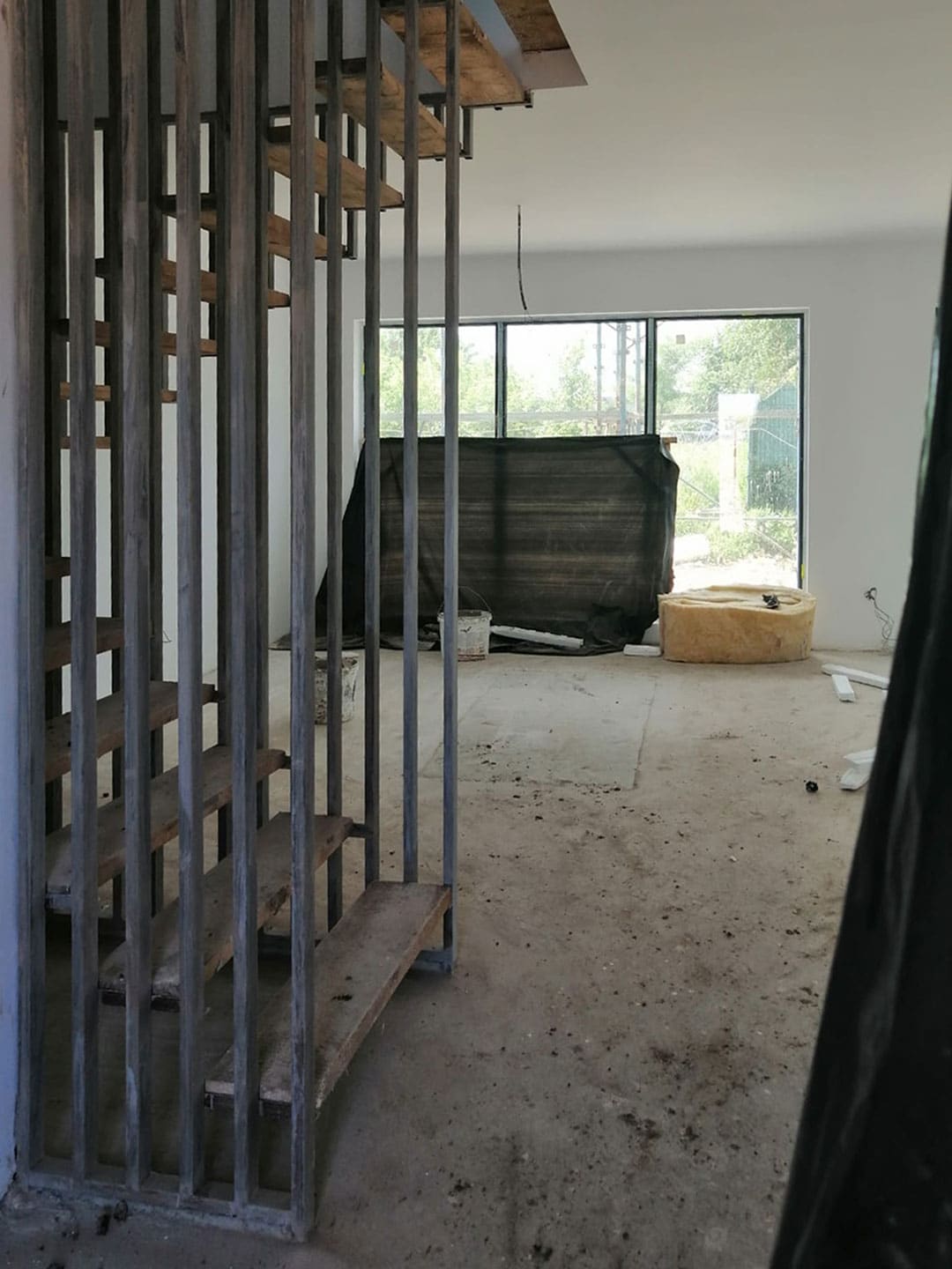 View from the entrance of the house towards the living room under construction.